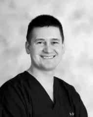 Black and white photo of Dr Brian Podbesek
